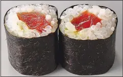  ??  ?? Not-so-super food: Sushi is damaging our bodies and our seas