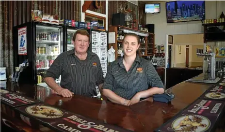  ?? Photo: Bev Lacey ?? TOP PUB: Serving up drinks at the Bull and Barley Inn is owner Bruce Dell and barmaid Amy Barnes.