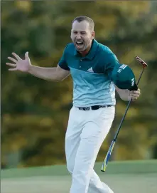  ?? ASSOCIATED PRESS ?? SERGIO GARCIA, OF SPAIN, reacts after making his birdie putt on the 18th green to win the Masters golf tournament after a playoff Sunday in Augusta, Ga.