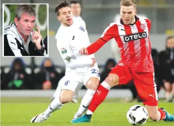  ?? Photos: Domenic Aquilina ?? Fortuna Dusseldorf (in red) and CS Universita­tea Craiova (in white) figured in a 1-1 draw at the National Stadium last Saturday. (Inset) Dusseldorf head coach Friedhelm Funkel