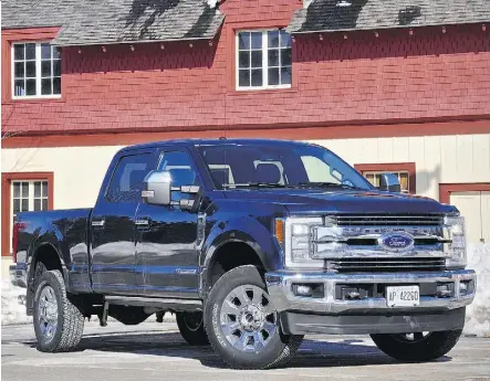  ?? PHOTOS: DEREK MCNAUGHTON/DRIVING ?? The powerful Ford F-350 Super Duty is an extremely stiff ride, but it can tow any payload that doesn’t call for a Mack truck.