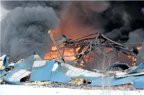  ?? DAVE JOHNSON/ WELLAND TRIBUNE ?? Multiple fire services from across Niagara Region provided mutual aid to Port Colborne Fire and Emergency Services as it battled a massive fire at Vinyl Works Canada on Barber Drive in Port Colborne Tuesday morning. The fire destroyed the plant. An...