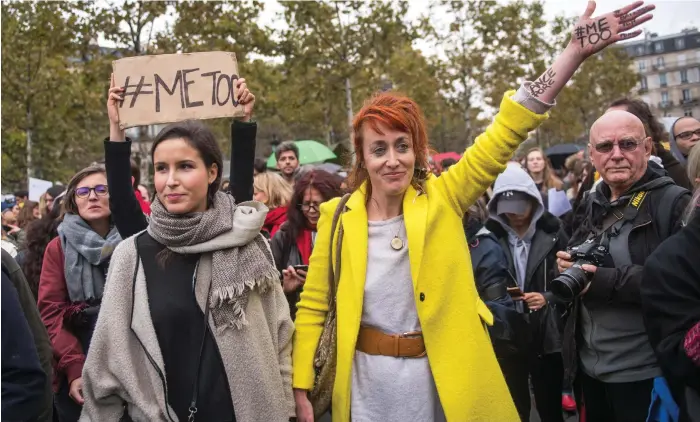  ??  ?? Women in Paris rally against gender-based violence. The hashtag #MeToo was establishe­d across social networks aimed at encouragin­g women to speak out about sexual abuse EPA