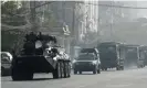  ?? Photograph: Nyein Chan Naing/EPA ?? Armoured vehicles drive along a road in Yangon, Myanmar, 15 February 2021.