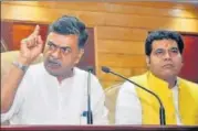  ?? HT ?? ▪ Union minister of state for power RK Singh with UP power minister Shrikant Sharma in Lucknow on Thursday.