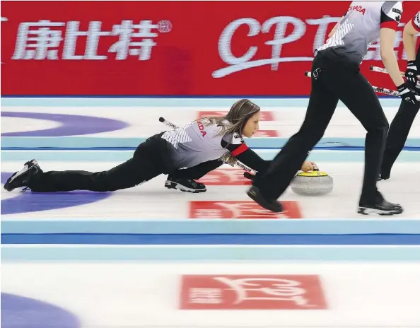  ?? ANDY WONG/THE ASSOCIATED PRESS ?? Skip Rachel Homan and her rink downed Russia 8-3 Sunday in Beijing for Canada’s first world gold since 2008.