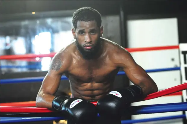  ?? Photos by Ernest A. Brown ?? Pawtucket native and 2007 Tolman graduate Ricky De Los Santos (above) will make his profession­al debut tomorrow night when he meets New Jersey native Jose Ortiz in a six-round featherwei­ght bout at Twin River Casino. De Los Santos went 5-0 with a knockout in his amateur career. The 28-year-old was a baseball and basketball player when he was a Tiger.