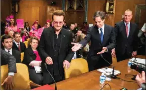  ?? ZACH GIBSON/THE NEW YORK TIMES ?? Bono takes his seat at a subcommitt­ee hearing of the Senate Appropriat­ions Committee on Capitol Hill on April 12.