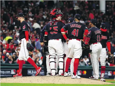 ?? GREGORY SHAMUS/GETTY IMAGES ?? Gone are the days when aces like Cleveland’s Corey Kluber, left, were expected to go the distance in a playoff game.