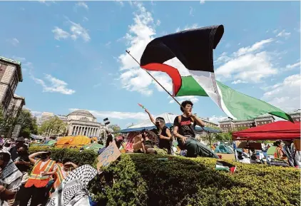  ?? Ted Shaffrey/Associated Press ?? Demonstrat­ors protest at a pro-Palestinia­n encampment at Columbia University in New York on April 29.