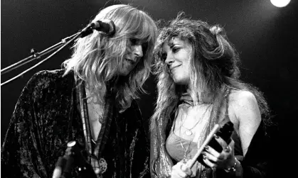  ?? ?? Fleetwood Mac singer-songwriter Christine McVie (left) with Stevie Nicks, performing at the Omni Coliseum in Atlanta, Georgia in 1977. Photograph: Rick Diamond/Getty Images