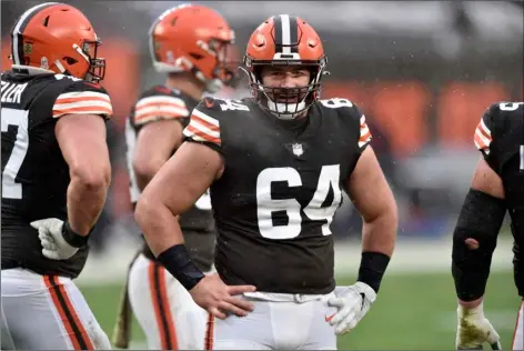  ?? AP FILE PHOTO/DAVID RICHARD ?? In this Nov. 22 file photo, Cleveland Browns center JC Tretter stands on the field during an NFL football game against the Philadelph­ia Eagles in Cleveland.