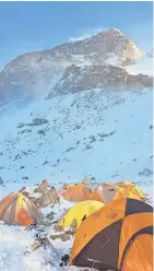  ?? CHELSEY BERG/FINDINGTHE­NORTH.COM ?? Tents are scattered on snowy Aconcagua at one of the mountain's higher camps.