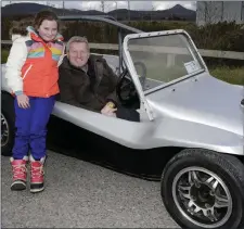  ??  ?? Jessica and Andrew O’Donohoe with their beach buggy at the Trials Drivers Club March Hare Run, which finished at Charleslan­d Golf Club.