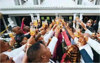  ?? ?? Guests toast to Johnnie Walker Gold at its launch in Vanderbijl­park.