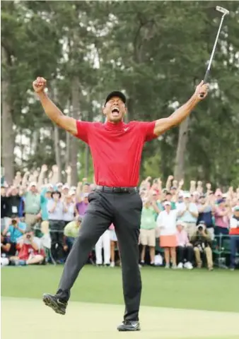  ?? Files/Reuters ?? Tiger Woods celebrates after winning the Masters at Augusta National last year.