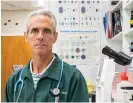  ?? ?? Dr. Byron De La Navarre, a veterinari­an with Animal House of Chicago, sits in the operating and research room of the Lincoln Square clinic on Tuesday.