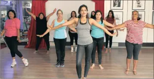  ??  ?? The Bollywood aerobics dance class, led by fitness instructor Fiona Pillay. It’s a fun way to keep fit and learn bhangra.