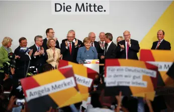  ?? Reuters ?? German Chancellor Angela Merkel has won but her majority vote share has eroded greatly