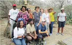  ??  ?? Ambassador­s pose for a photo at David Livingston­e’s statue in Victoria Falls