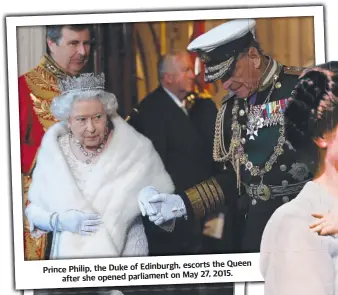  ?? ?? escorts the Queen Prince Philip, the Duke of Edinburgh, 27, 2015. after she opened parliament on May