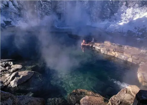  ??  ?? Clothing is optional at Strawberry Park Hot Springs near Steamboat Springs.