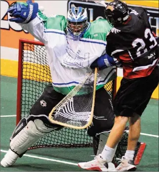  ?? CLIFFORD SKARSTEDT Examiner ?? Peterborou­gh Merit Precision Lakers goalie Donovan Fleischer closes the door against Burlington Chiefs’ Tyler Albrechtl during Game 4 quarter-final OLA Junior A action on Friday night at the Memorial Centre. Peterborou­gh won 10-9 in overtime, forcing a...