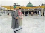  ??  ?? Nazim Ali Nizami and Asif Nizami, clerics from Hazrat Nizamuddin dargah in Delhi, at a shrine in Pakistan’s Punjab province.