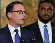  ?? MARC LEVY — THE ASSOCIATED PRESS FILE ?? Gov.-elect Josh Shapiro, left, and Lt. Gov.-elect Austin Davis are among top Pennsylvan­ia officials who will receive salary increases in 2023.