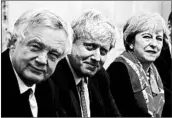  ?? PETER NICHOLLS/GETTY-AFP ?? David Davis, from left, and Boris Johnson have both resigned from British Prime Minister Theresa May’s Cabinet.