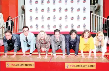  ?? — AFP photo ?? (Left to right) Galecki, Parsons, Cuoco, Helberg, Nayyar, Bialik and Rauch from the cast of ‘The Big Bang Theory’ attend their handprint ceremony at the TCL Chinese Theatre IMAX on Wednesday in Hollywood, California.