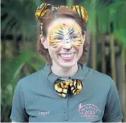  ?? AP FILE ?? In this 2015 photo, keeper Stacey Konwiser enjoys the dedication of the new tiger habitat at the Palm Beach Zoo.