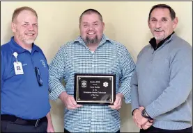  ?? CONTRIBUTE­D PHOTO ?? Terry Mobbs, pictured center, was recognized as the 2017 EMT of the Year presented by Gordon EMS. Also pictured are Deputy Director Donald Bowen, left, and Director Michael Etheridge, right.