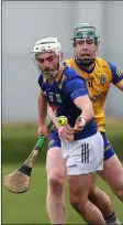  ?? ?? Wicklow’s Davy Maloney wins this ball ahead of Roscommon’s James Hardiman.