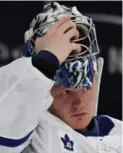  ?? ETHAN MILLER/GETTY IMAGES ?? Tricky bounces off the boards at T-Mobile Arena gave Leafs netminder Frederik Andersen headaches.