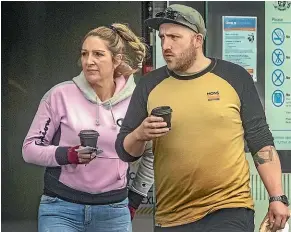  ?? STUFF ?? Joanna and Kane McNeill, of Pet and Garden Supplies, leave the Christchur­ch District Court yesterday.