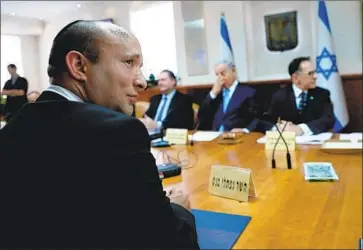  ?? Thomas Coex AFP/Getty Images ?? ISRAELI Education Minister Naftali Bennett, while echoing a call for early elections, threatened to join Avigdor Lieberman in quitting the government unless he is named defense minister, the post Lieberman left.