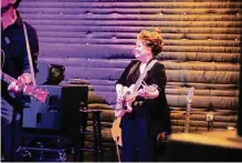  ?? Matthew Paskert ?? Debbie Horton plays lead guitar in the touring show “Johnny Cash: The Official Concert Experience.”