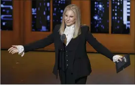  ??  ?? Barbra Streisand presents the award for best musical at the Tony Awards in New York on June 12, 2016.