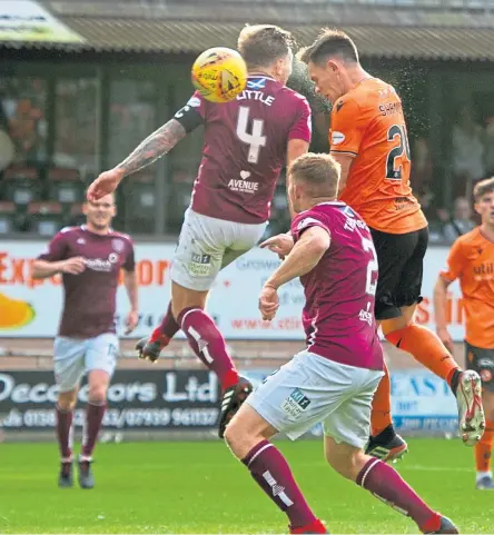  ??  ?? Dundee United’s Lawrence Shankland scores his second goal in the victory over Arbroath. SNS.