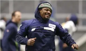  ??  ?? Seahawks running back Marshawn Lynch runs through warmups at Tuesday’s practice in Renton, Washington. Photograph: Elaine Thompson/AP