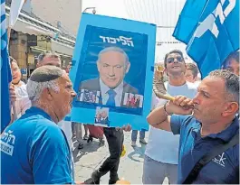  ?? AFP ?? Campaña. Seguidores de Benjamin Netanyahu, en Jerusalén.