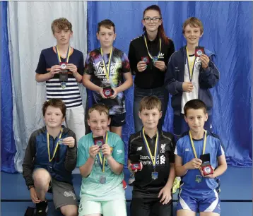  ??  ?? TheWolfe Tone YC’s under-12s with their runner up medals in the league and the Shield (L-R) back: Emmet O’Malley, Peter Miller, Ella Norton, Matthias Clark. Front: Joe Megannety, Shane Merriman, Darragh Howard, Max Condrea.