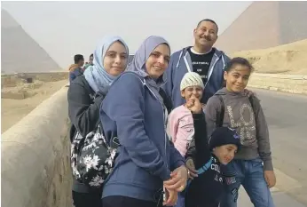  ??  ?? Dana Al Jarrar, 14, left, her mother, Nahid Abdul Qader, father, Amjad Al Jarrar, sisters Bissan, 9, and Yara, 12, and her brother, Mohammed, 6, who is in intensive care