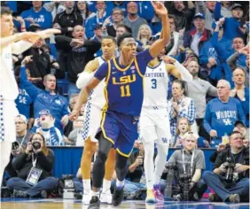  ?? AP PHOTO/JAMES CRISP ?? LSU’s Kavell Bigby-Williams (11) celebrates after tipping in the game-winning shot against Kentucky on Tuesday in Lexington, Ky. LSU won 73-71.