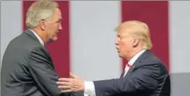  ?? AP ?? President Donald Trump shakes the hand of Senator Luther Strange ahead of the election.