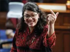  ?? CAROLYN KASTER — THE ASSOCIATED PRESS ?? Then Rep.-elect Rashida Tlaib of Michigan, is shown Thursday on the house floor before being sworn into the 116th Congress at the U.S. Capitol in Washington. Tlaib exclaimed at an event late Thursday that Democrats were going to “impeach the mother———.” According to video and comments on Twitter, she apparently made the comments during a party hosted by the liberal activist group MoveOn.