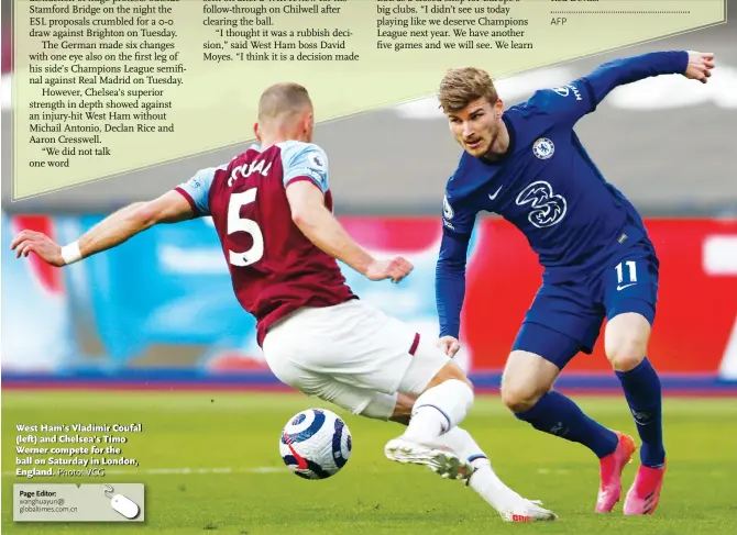  ?? Photo: VCG ?? West Ham’s Vladimir Coufal ( left) and Chelsea’s Timo Werner compete for the ball on Saturday in London, England.