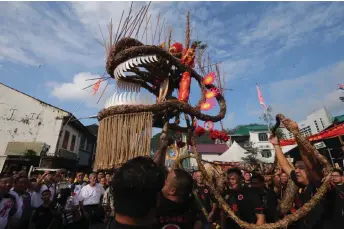  ?? — Photo by Kong Jun Liong ?? The Fire Dragon is paraded during last year’s Seng Ong Kong deity procession.