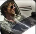  ?? THE ASSOCIATED PRESS ?? This image released by Universal Pictures shows Tom Cruise as Barry Seal in a scene from, “American Made.”